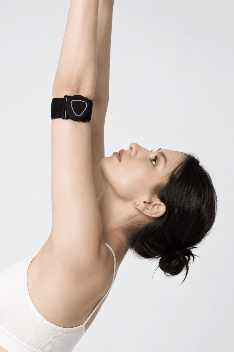 Woman wearing Aalok Band Single with an Aalok Patch on a white background