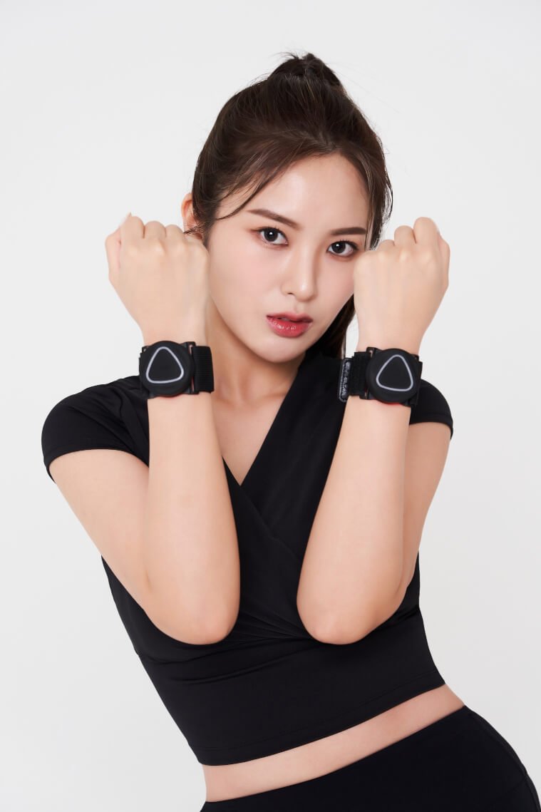 Woman wearing Aalok Band Single with Aalok Patch on a white background