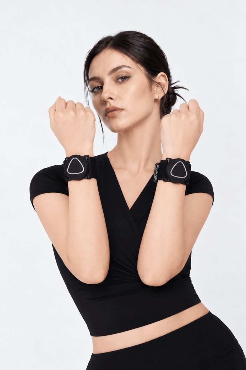 Woman wearing Aalok Band Single with Aalok Patch on a white background