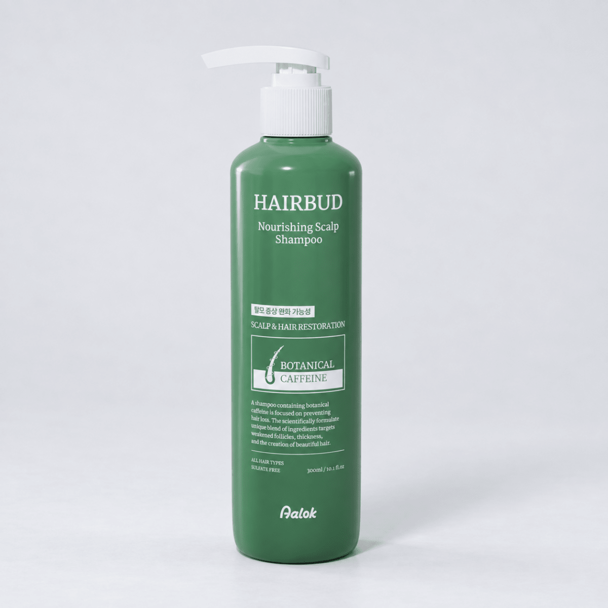 Green shampoo bottle with pump labeled 'HAIRBUD' on a light background
