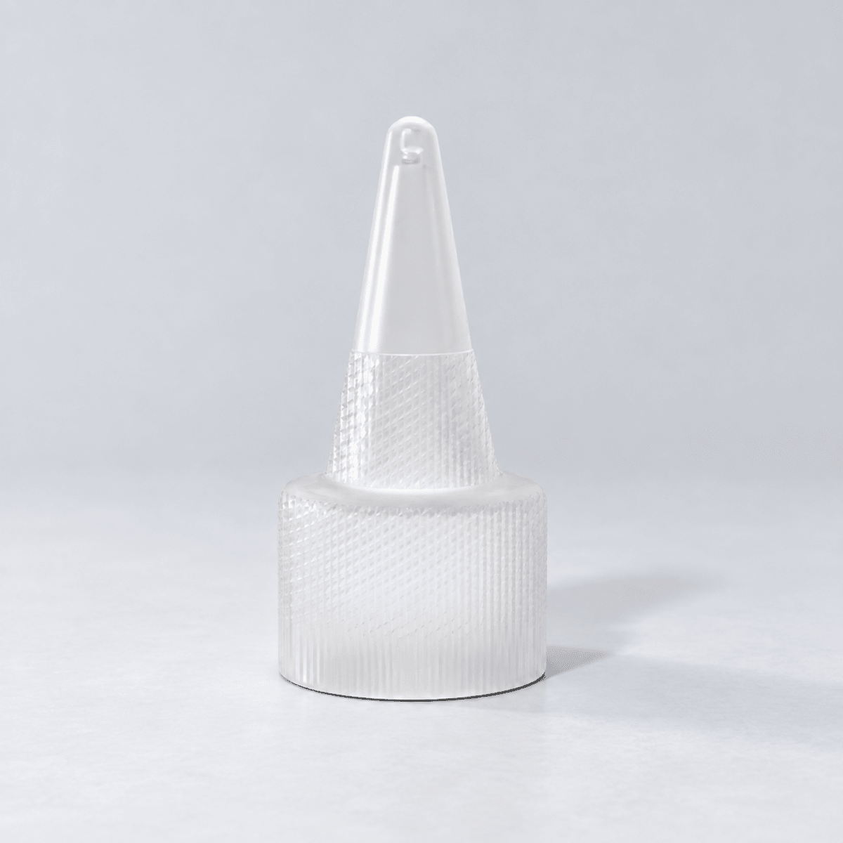 Clear plastic cone-shaped object on a light background
