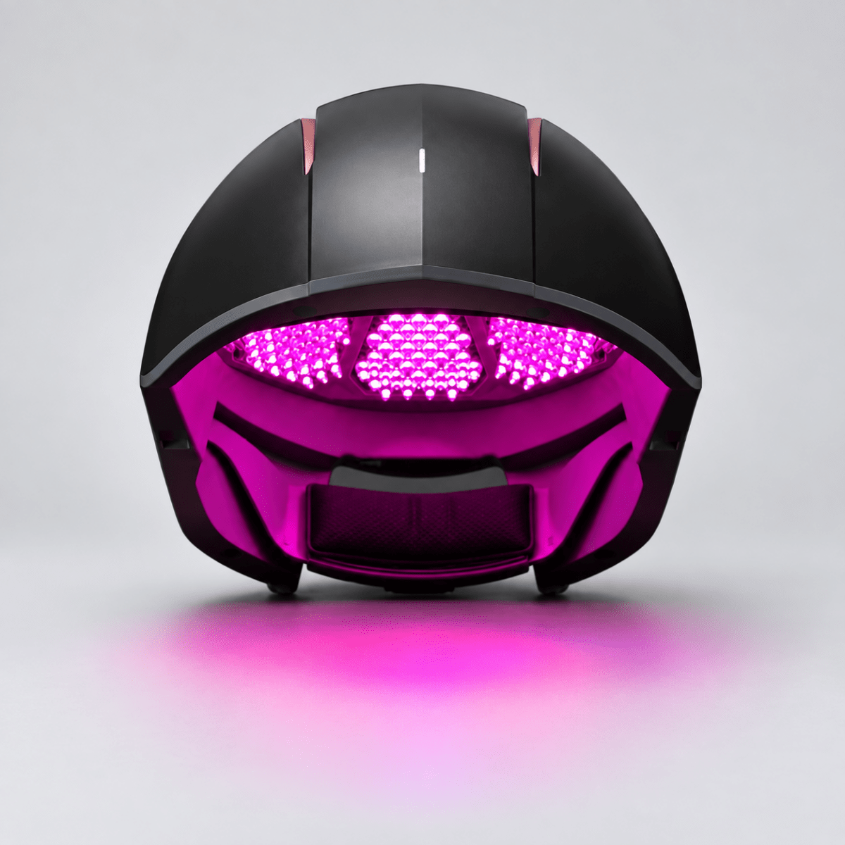 Aalok Hairbud with purple LED lights on a light background
