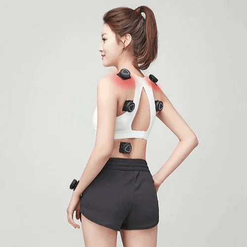 A woman wearing Aalok Patches on her back with a gray background