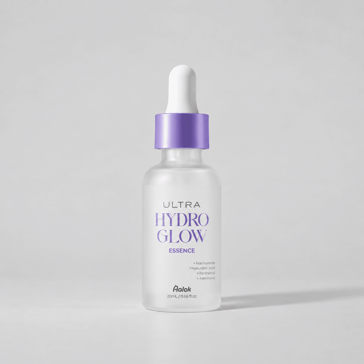 Skincare serum bottle labeled 'Ultra Hydro Glow Essence' on a light background
